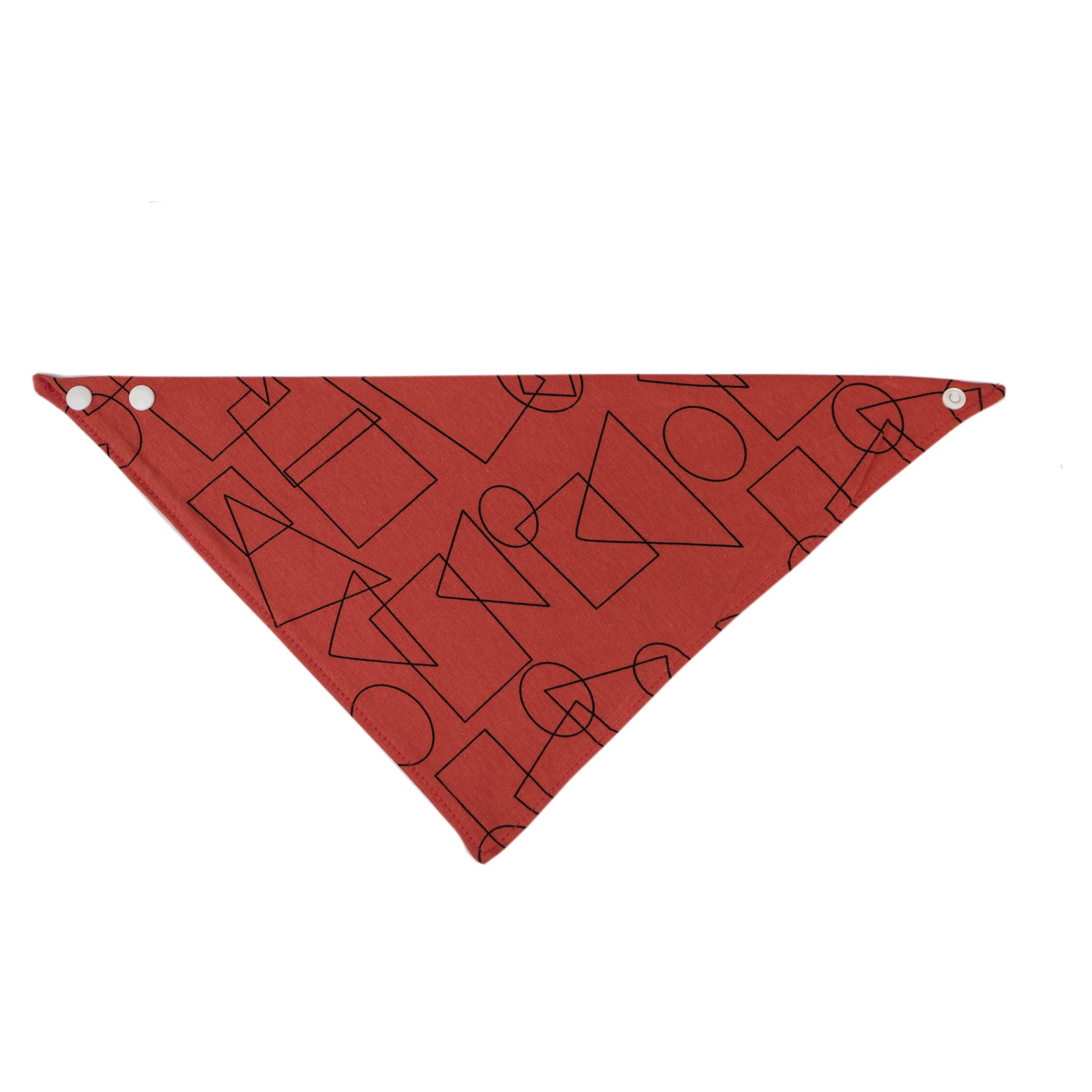 Rdeča rutka z motivom geometričnih likov.